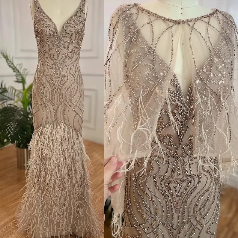 Elegant embellished evening gown with cape