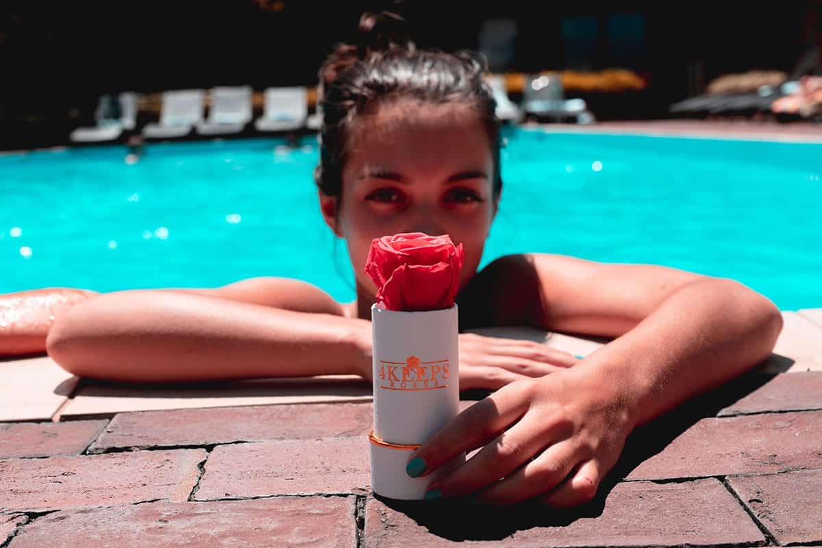 A girl with 4Keeps Roses