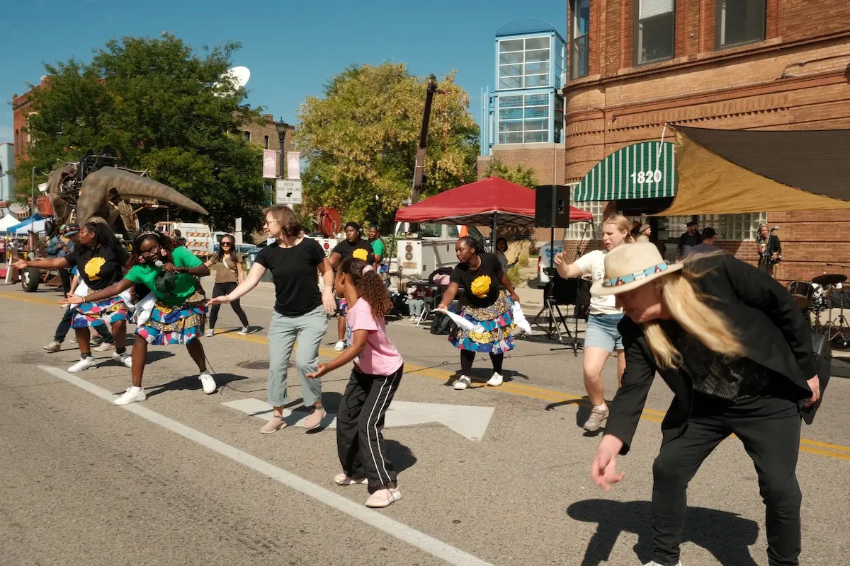 people dancing in the street