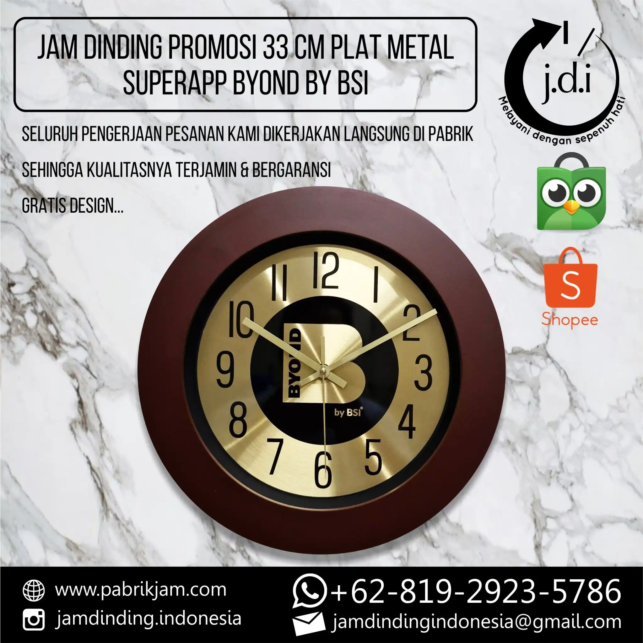 Jam dinding custom logo 33cm Byond by BSI, desain metal elegan untuk branding profesional dari https://pabrikjam.com