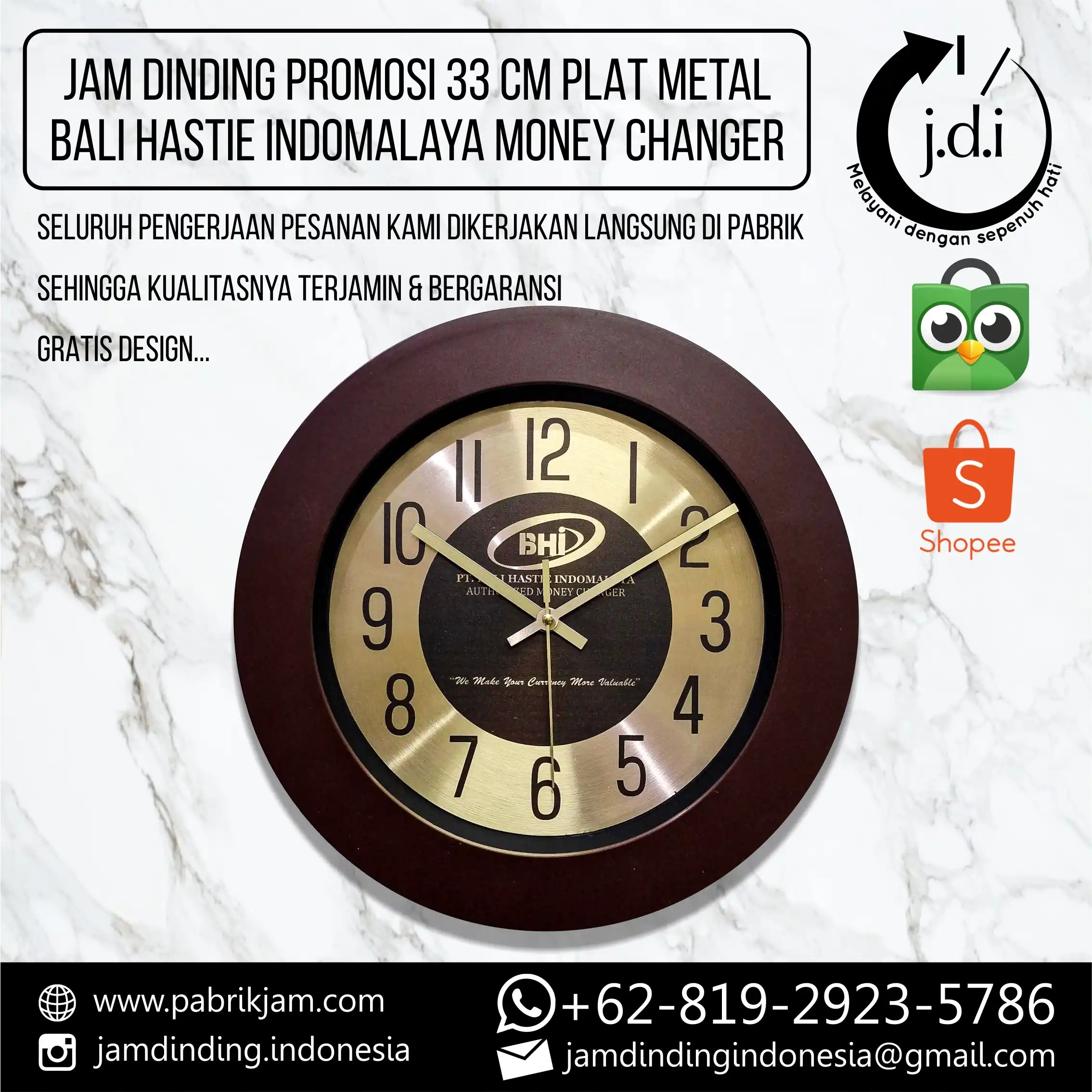 Jam BHI 33cm custom lis kayu metal gold untuk branding BHI Money Changer - merchandise promosi Bali dari https://pabrikjam.com