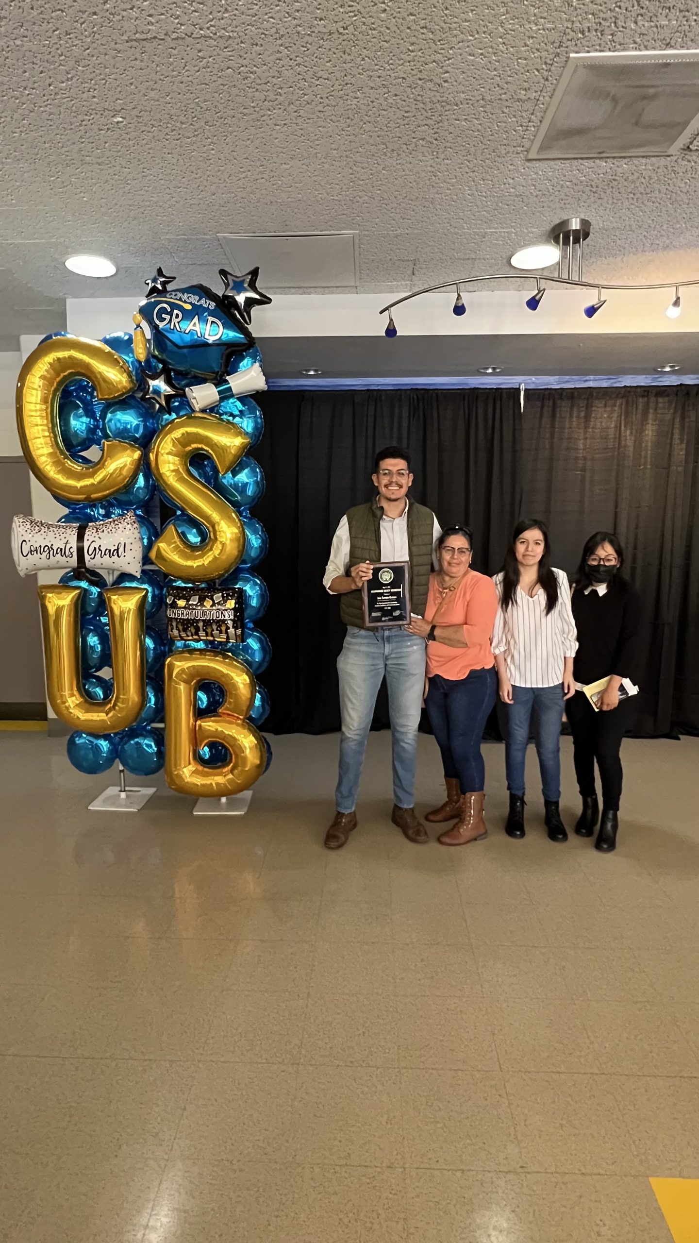 Jose being inducted into the Roadrunner Society.