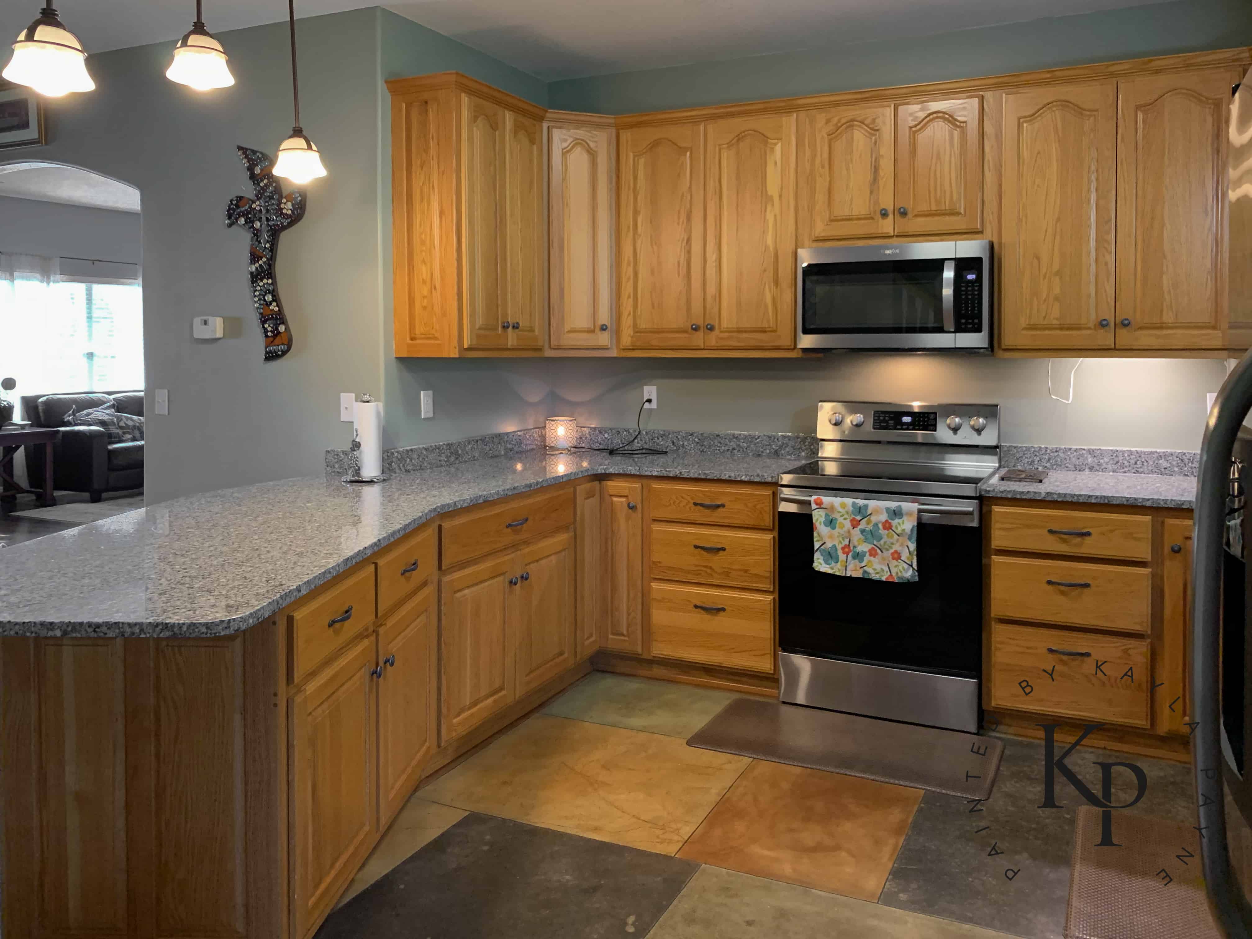Sage Green Kitchen With Oak Cabinets - Benjamin Moore Soft Chamois Bye Bye Honey Oak Honey Oak Kitchen Cabinets Oak Kitchen Cabinets How To Paint Oak Painting Kitchen Cabinets Can You Paint Oak Cabinets Can You Paint Wood Cabinets