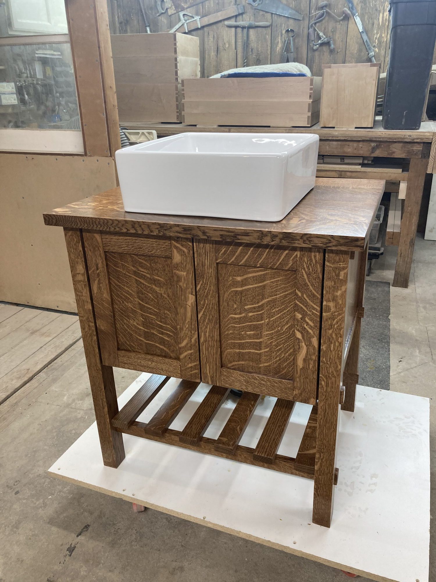 "Farmhouse Custom Oak Vanity with White Vessel Sink, from pdkcontracting.com:"