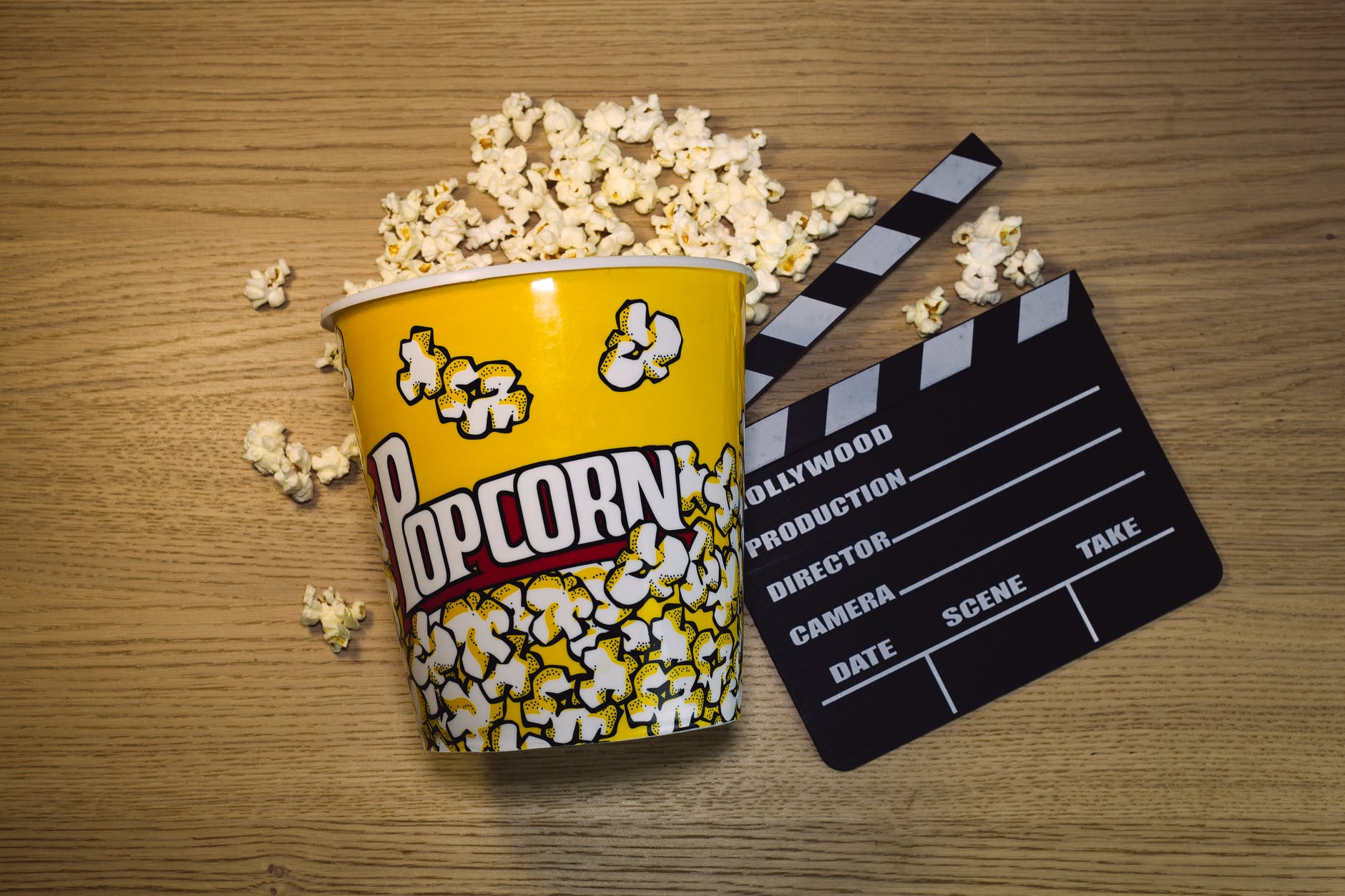 popcorn in black and yellow ceramic mug