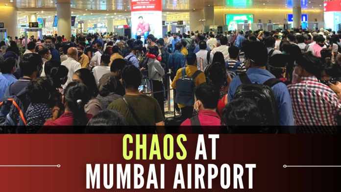 Chaos at Mumbai Airport Terminal 2 (1) Massive crowds of passengers were seen sitting or moving around in Terminal 2 due to the systems glitch