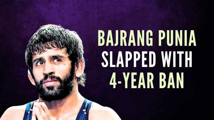 Bajrang Punia slapped with 4-year ban Olympics bronze medallist Bajrang Punia has been handed a 4-year suspension by NADA for refusing to provide a urine sample during the selection trials for the national team