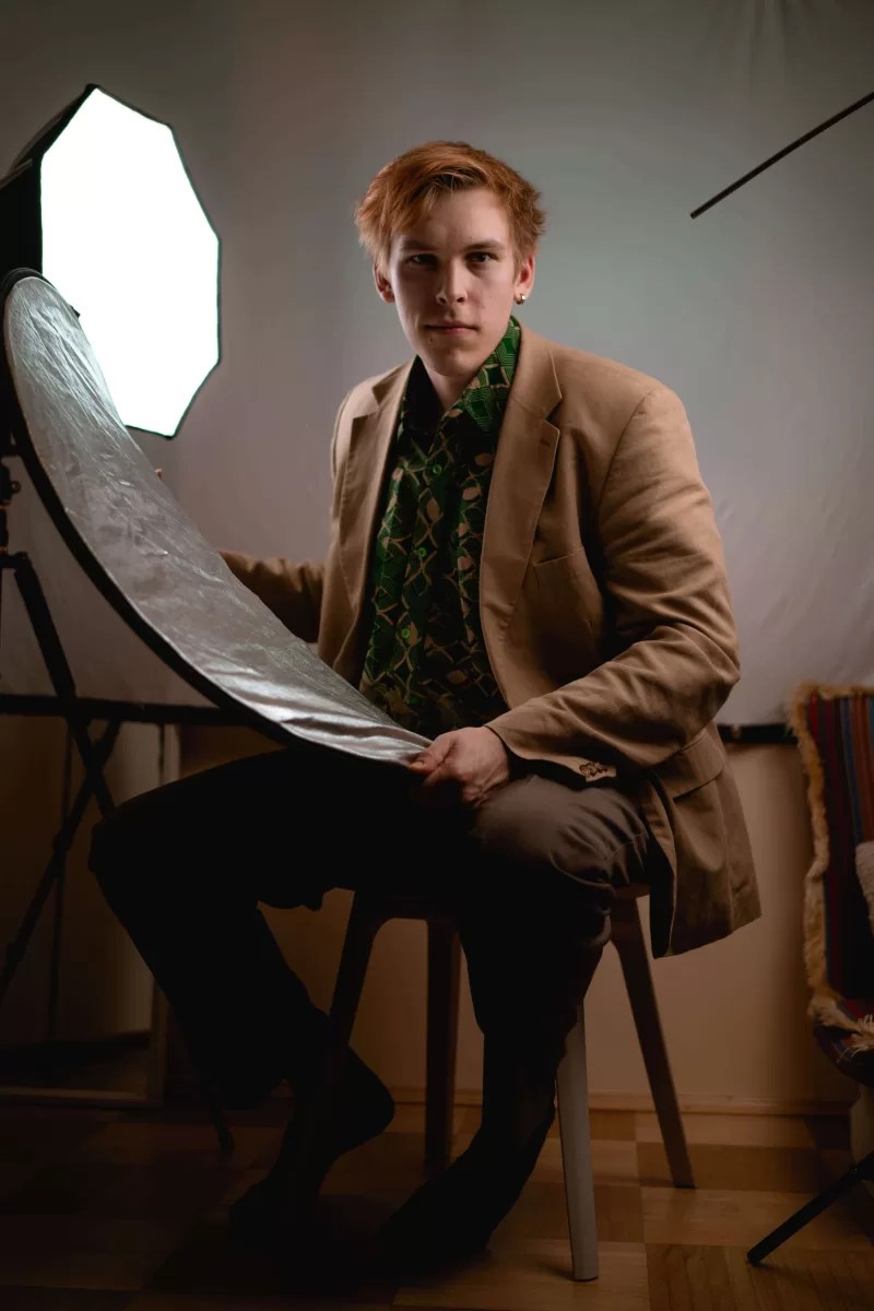 Portrait of the photographer Fedor Vasilev in his studio