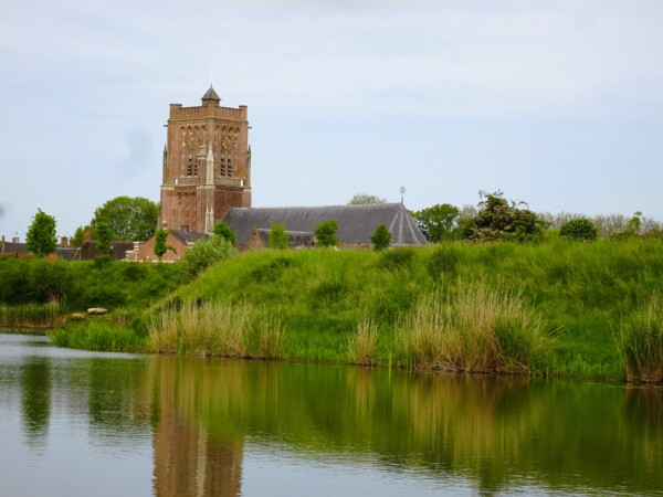 View of the Sint-Martinuskerk from the Moat in Woudrichem, Netherlands