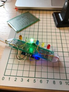 perfboard Arduino weather indicator, with 6 LEDs for different weather conditions. Green LED shining.
