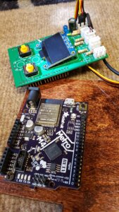 Adafruit metro Arduino and OLED display on counter top