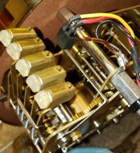 IR sensor connected to clock mechanism