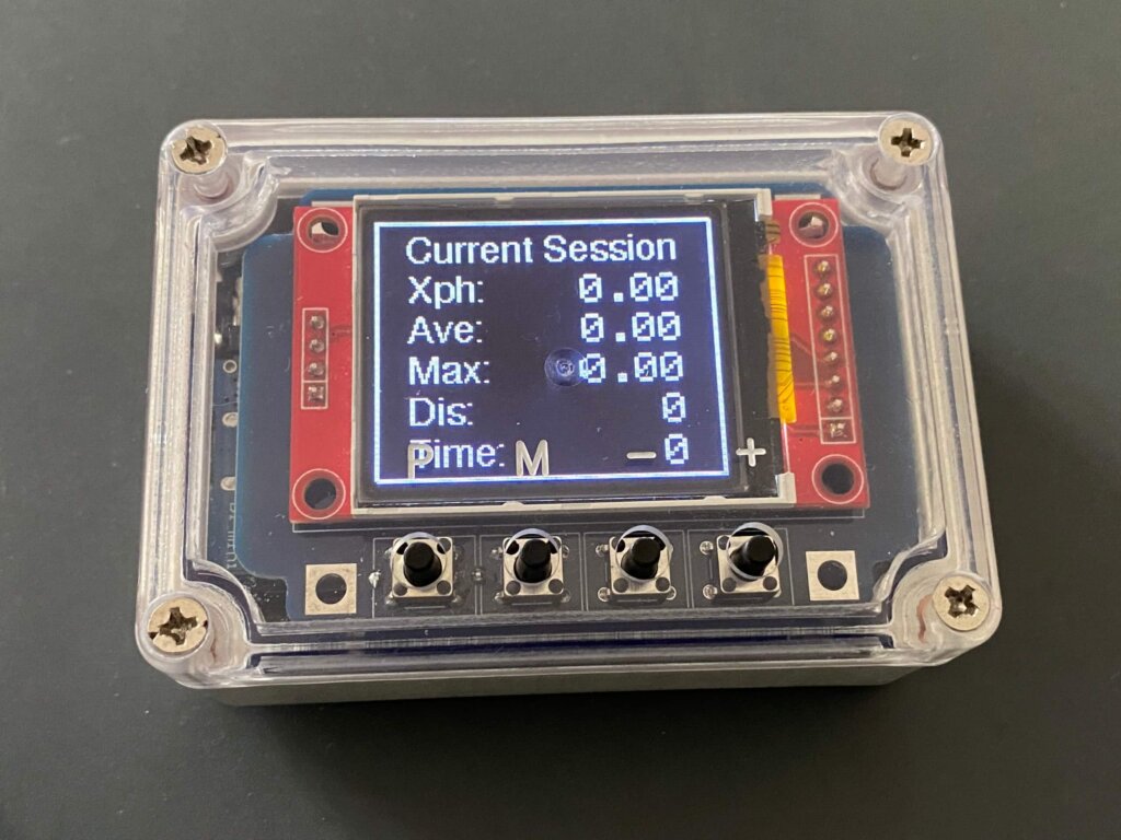 plastic enclosure with buttons and listing session information - this is called petbit, it's an Arduino fitbit