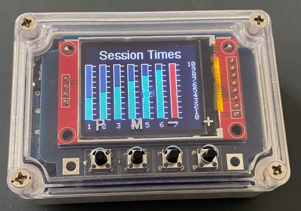 plastic enclosure with buttons and LCD screen showing an graphed bars - this is called petbit, it's an Arduino fitbit