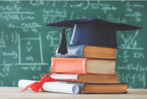 Graduation cap on a stack of books