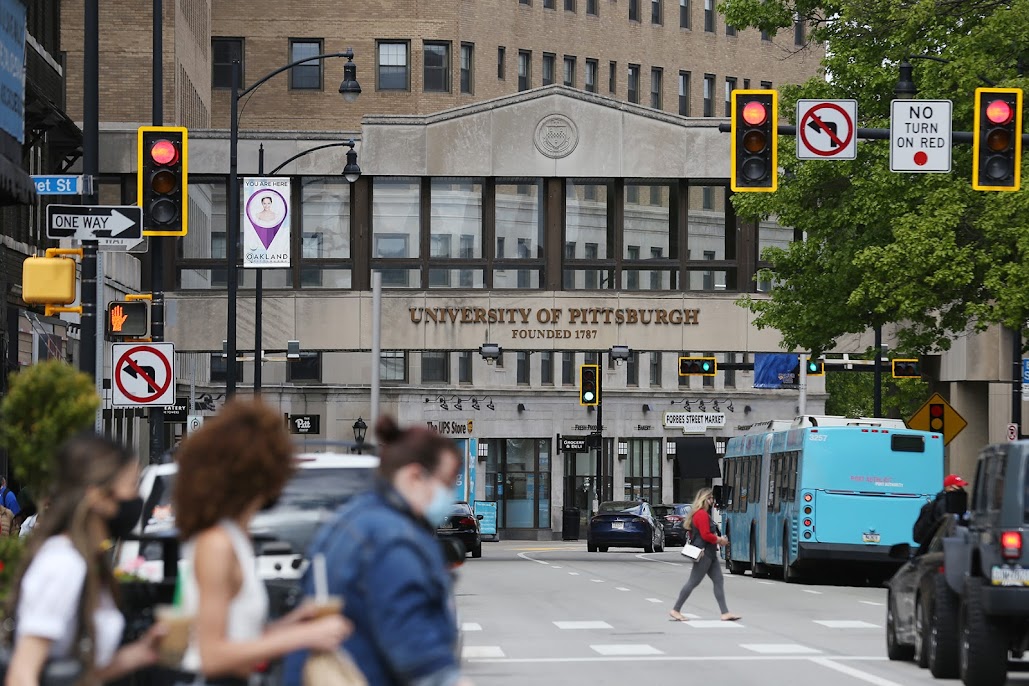University of Pittsburgh bridge walkway and signage