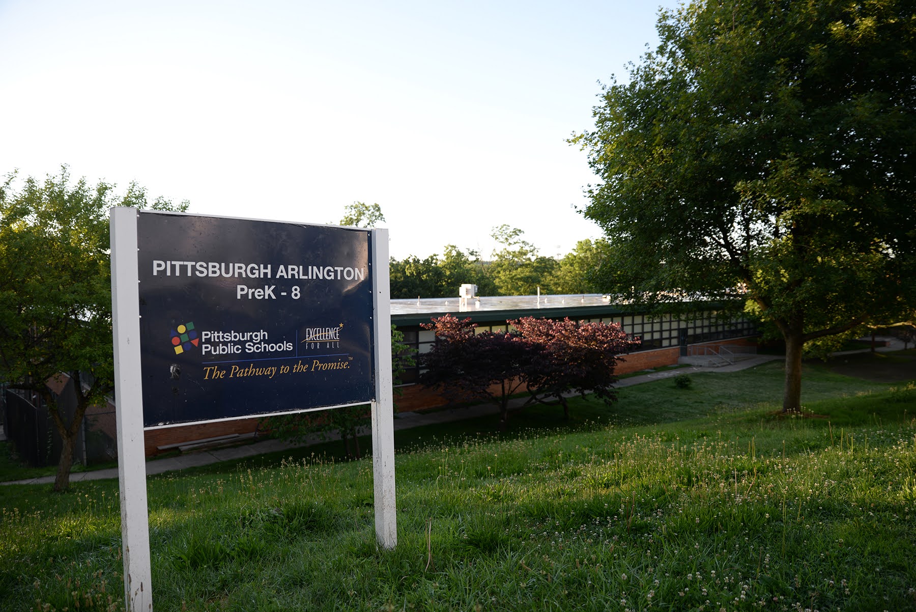 The Pittsburgh Arlington elementary school sign in front of the school building.