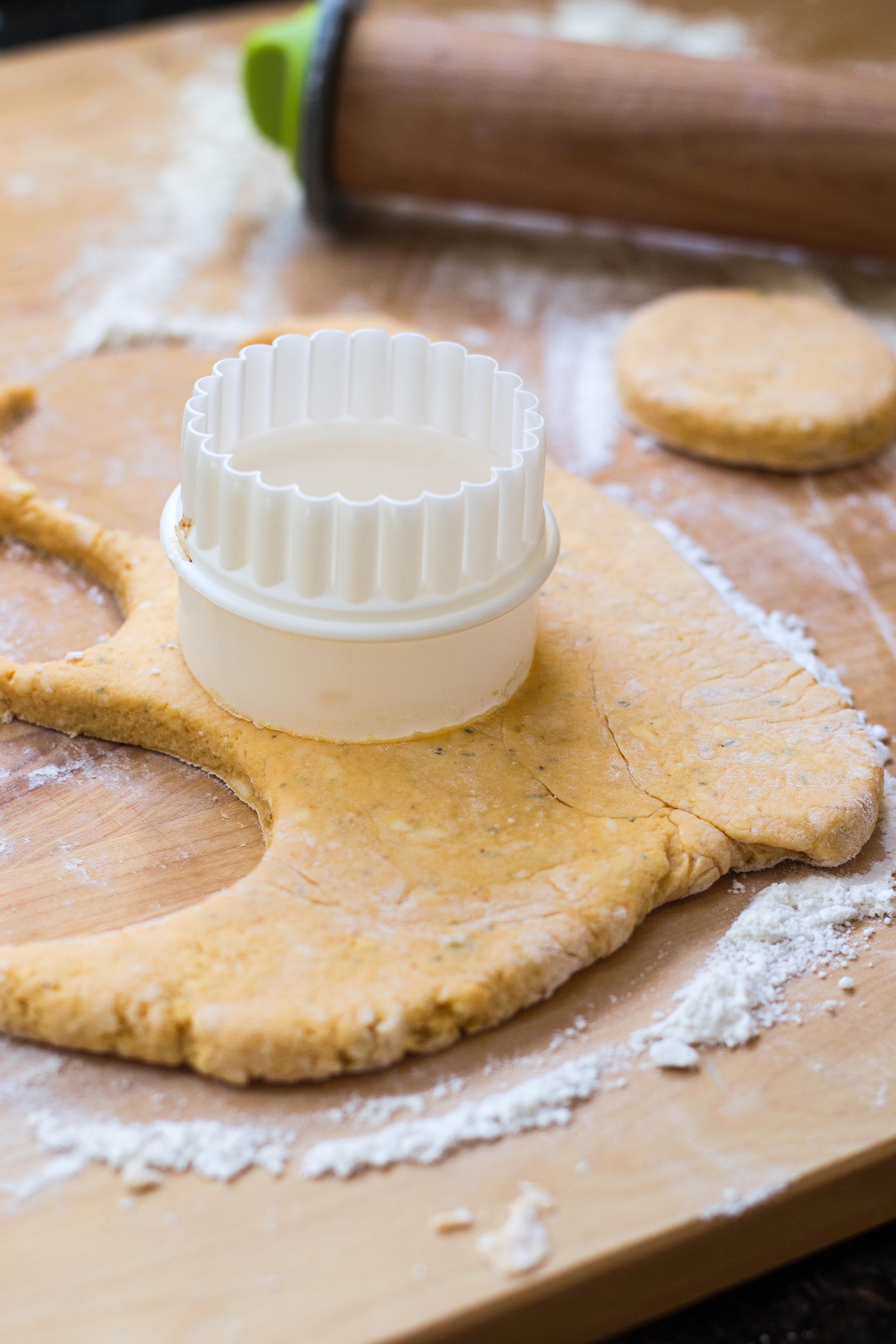 Herbed Sweet Potato Biscuits – a soft, sweet, and subtly savory biscuit. Ditch the dinner rolls and serve these instead! | QueenofMyKitchen.com