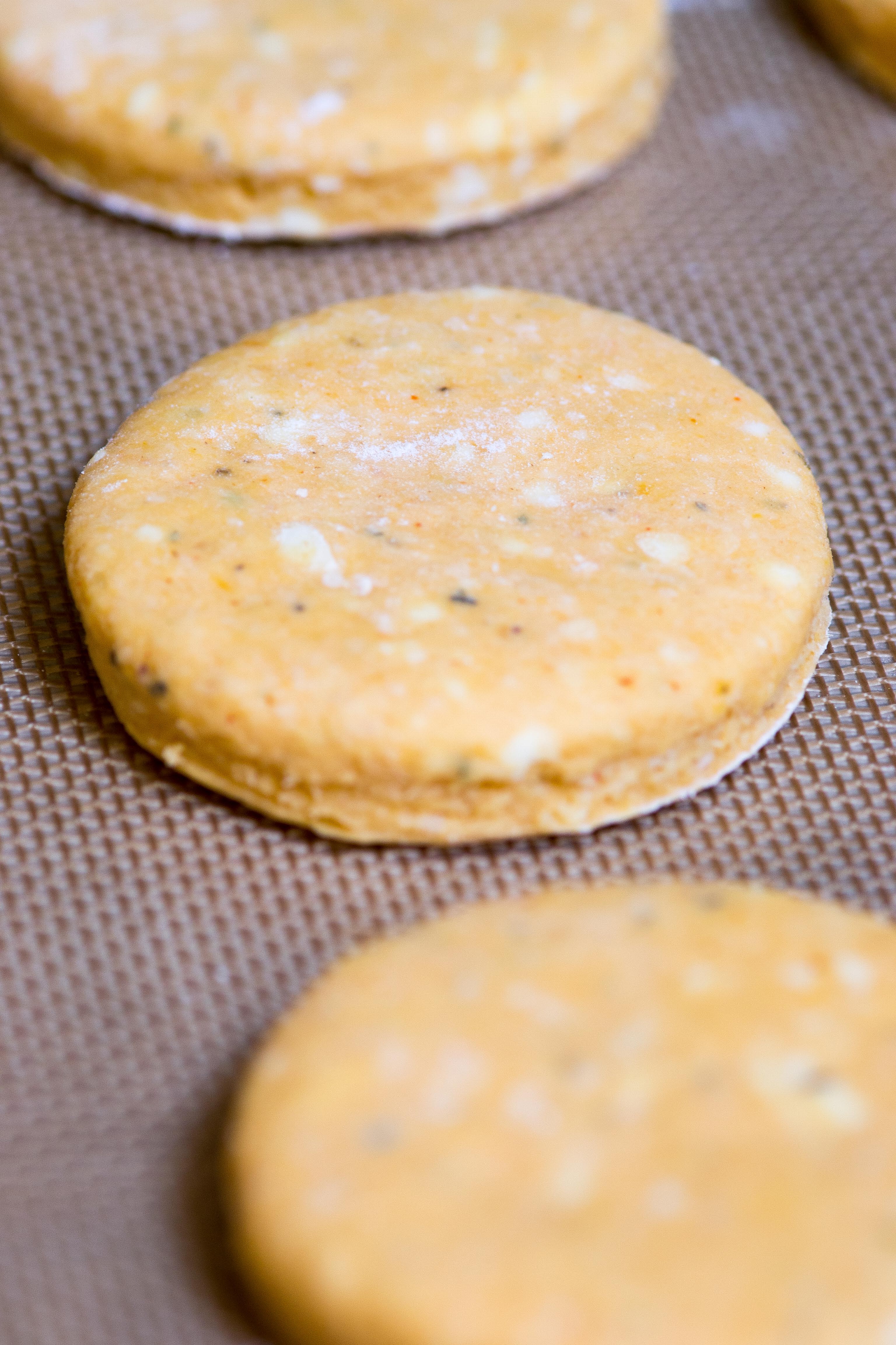 Herbed Sweet Potato Biscuits – a soft, sweet, and subtly savory biscuit. Ditch the dinner rolls and serve these instead! | QueenofMyKitchen.com
