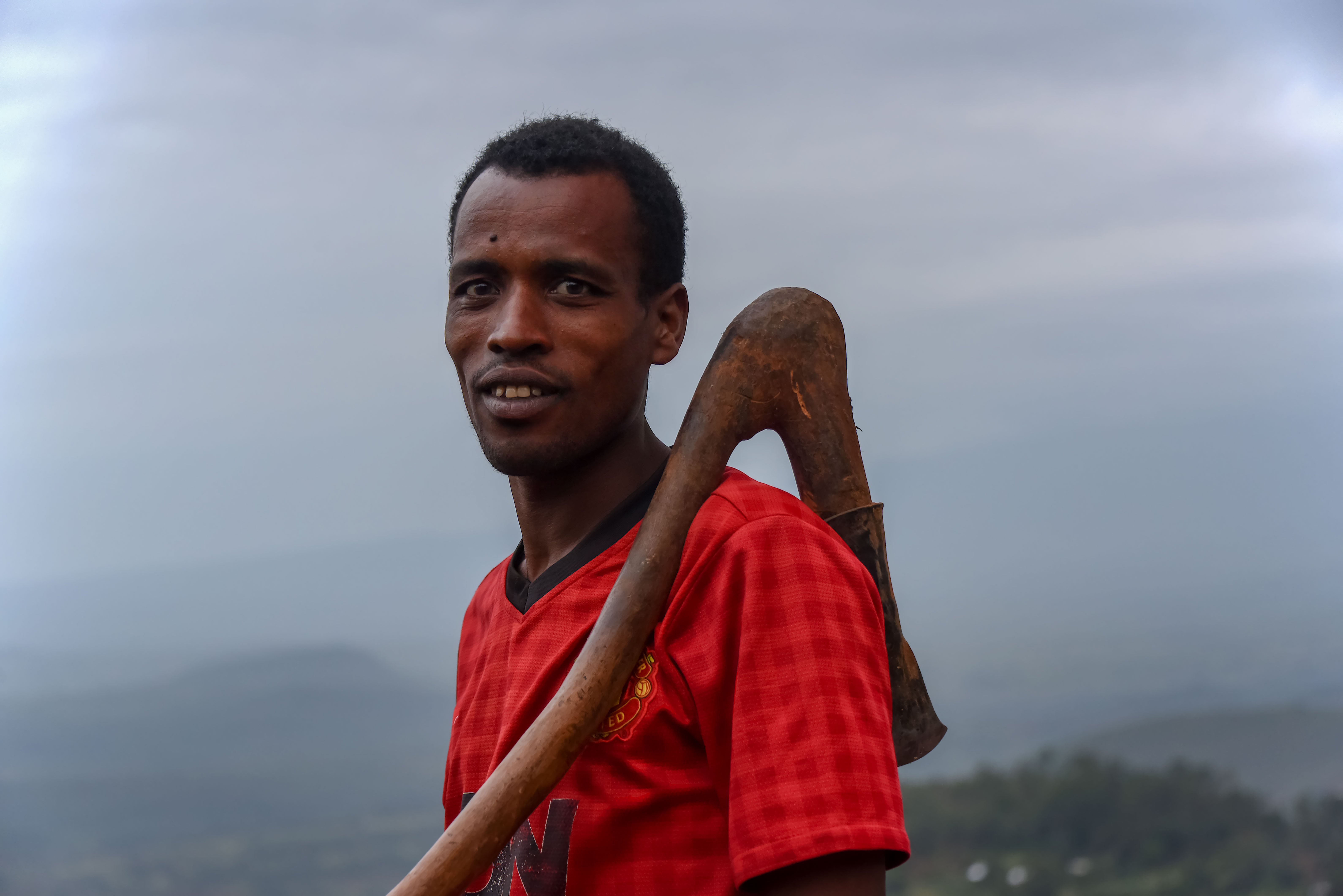 African farmer with a hoe