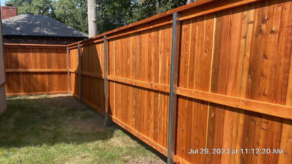 What is the average lifespan of a residential wood fence?