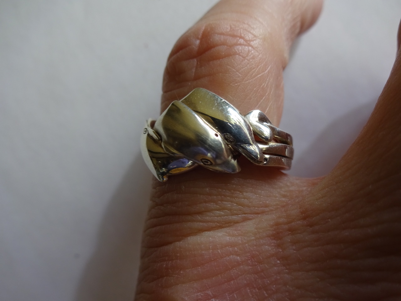 3 DOLPHIN PUZZLE RING Rasnick Jewelry