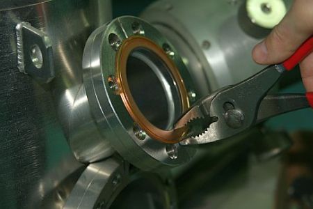 Grip edges of copper gasket