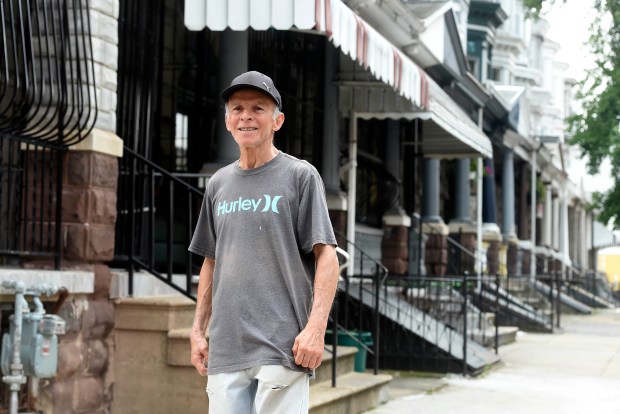 Justo de Jesus has been part of a neighborhood watch along with church members in the 800 block of Chestnut Street. (BILL UHRICH - READING EAGLE)
