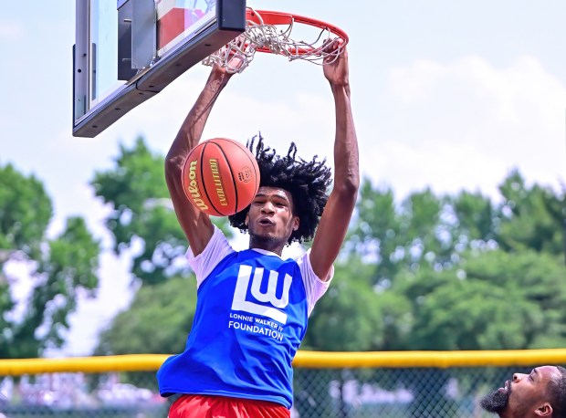 Reading Rebels forward Javon Adams goes for a dunk at the 2024 Stop the Violence Tournament hosted by the Lonnie Walker IV Foundation at Baer Park in Reading. (COURTESY OF BILL SNOOK)