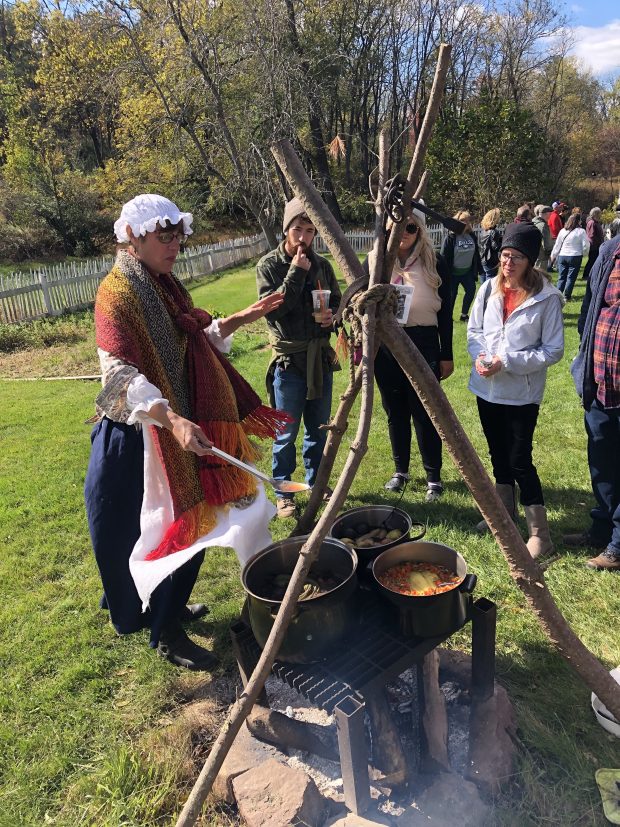 A wool-dyeing demonstration over an open fire at Daniel Boone Homestead. (Daniel Boon Homestead Associates)
