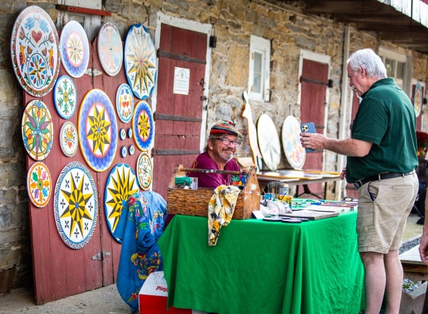 Hex sign artist Eric Claypoole of Lenhartsville, demonstrated his traditional barn art at the Pennsylvania German Cultural Heritage Center's Heemet Fescht in Kutztown on Sept. 21. (Photo courtesy of Abby Regensburger/Kutztown University)