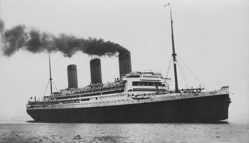 Photo of RMS Majestic, a three-funneled ocean liner.