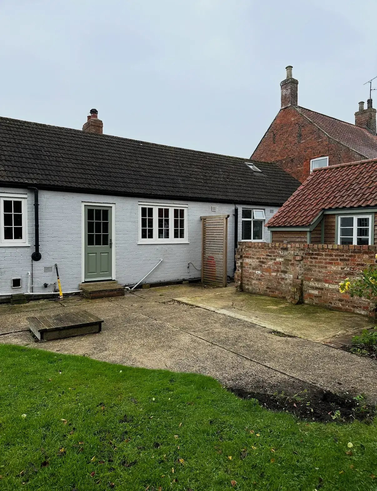 Landscape gardeners in Lincoln assessing garden before landscaping work begins