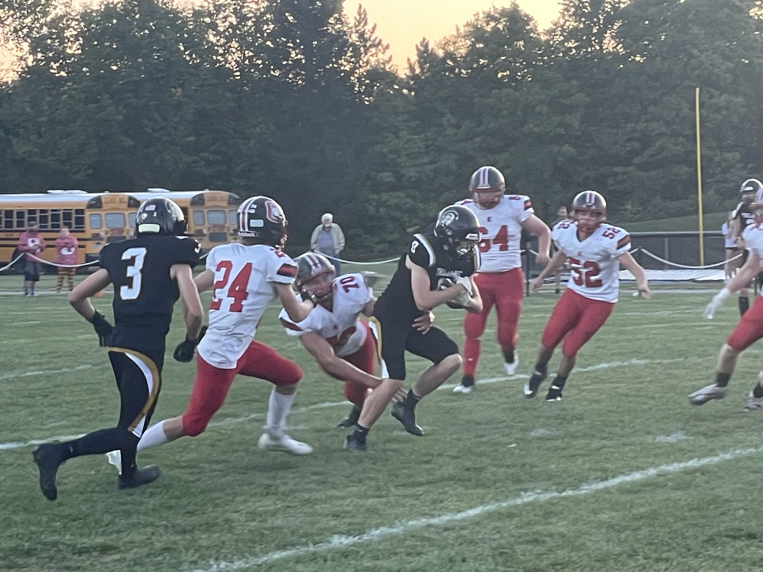 Football runner gets tackled