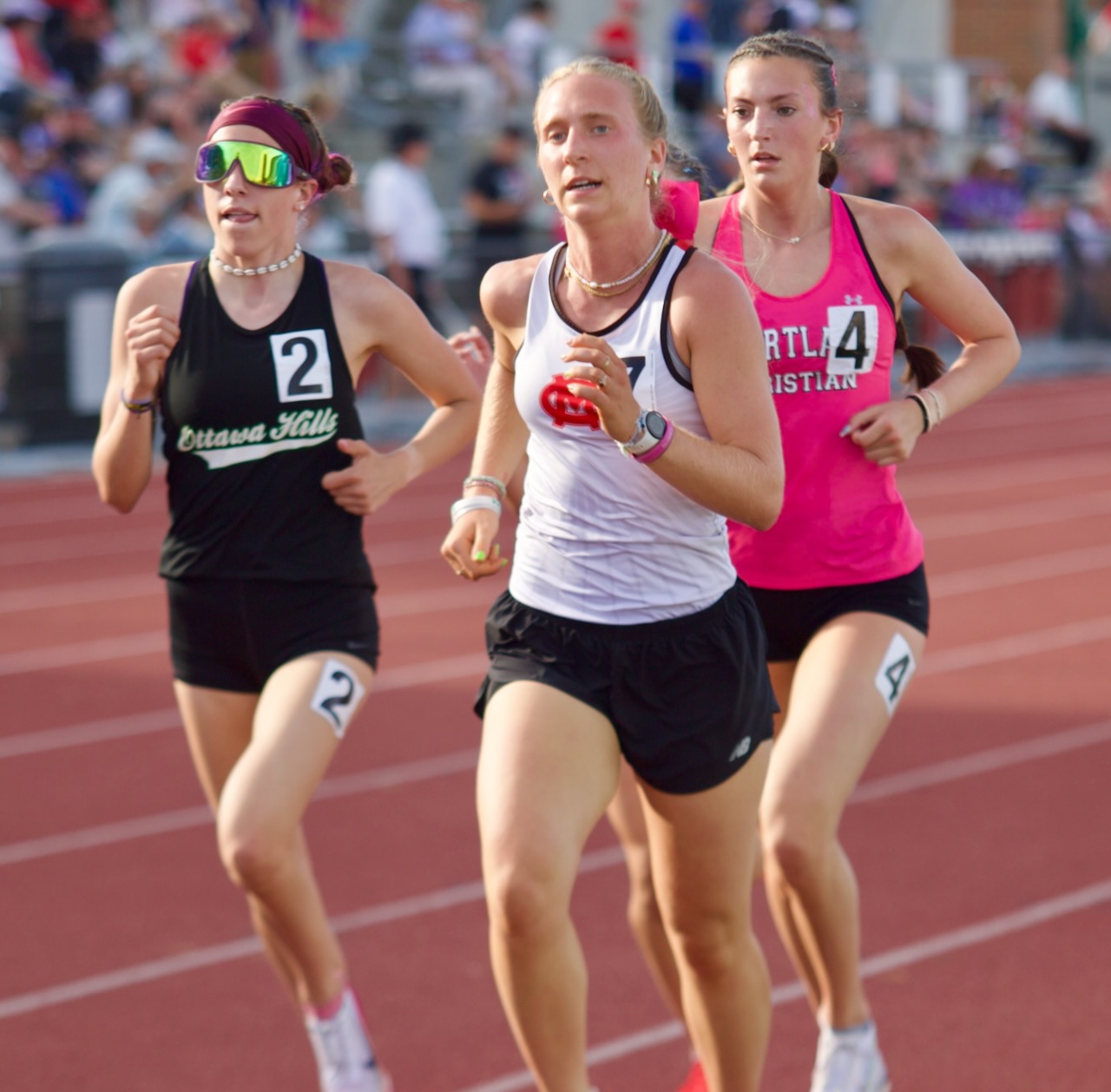 a runner leads the pack