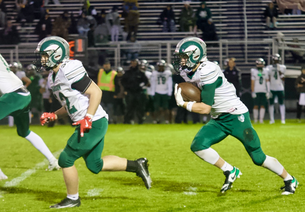 a ball carrier follows his blocker