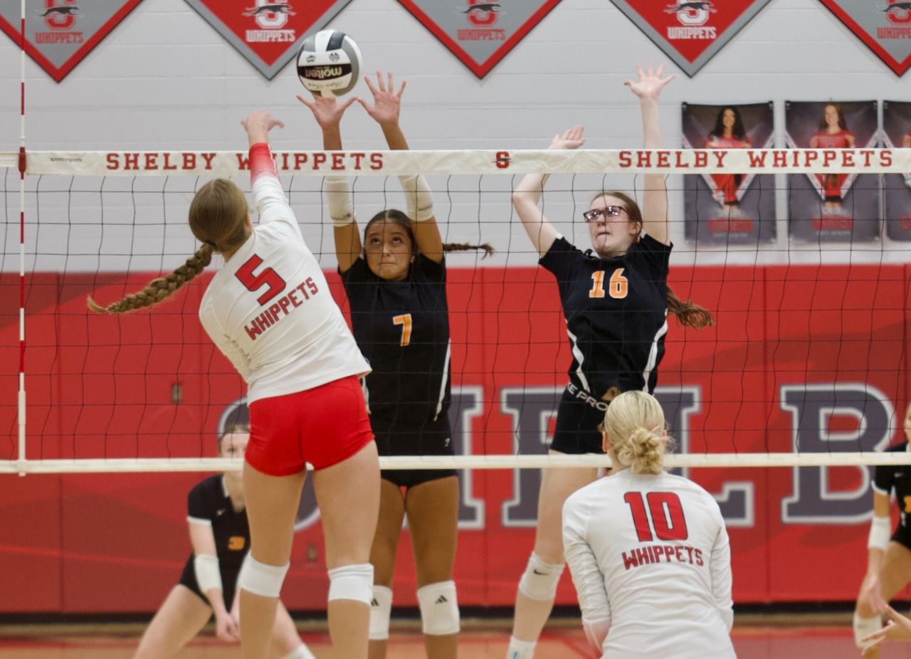 players team up for a block