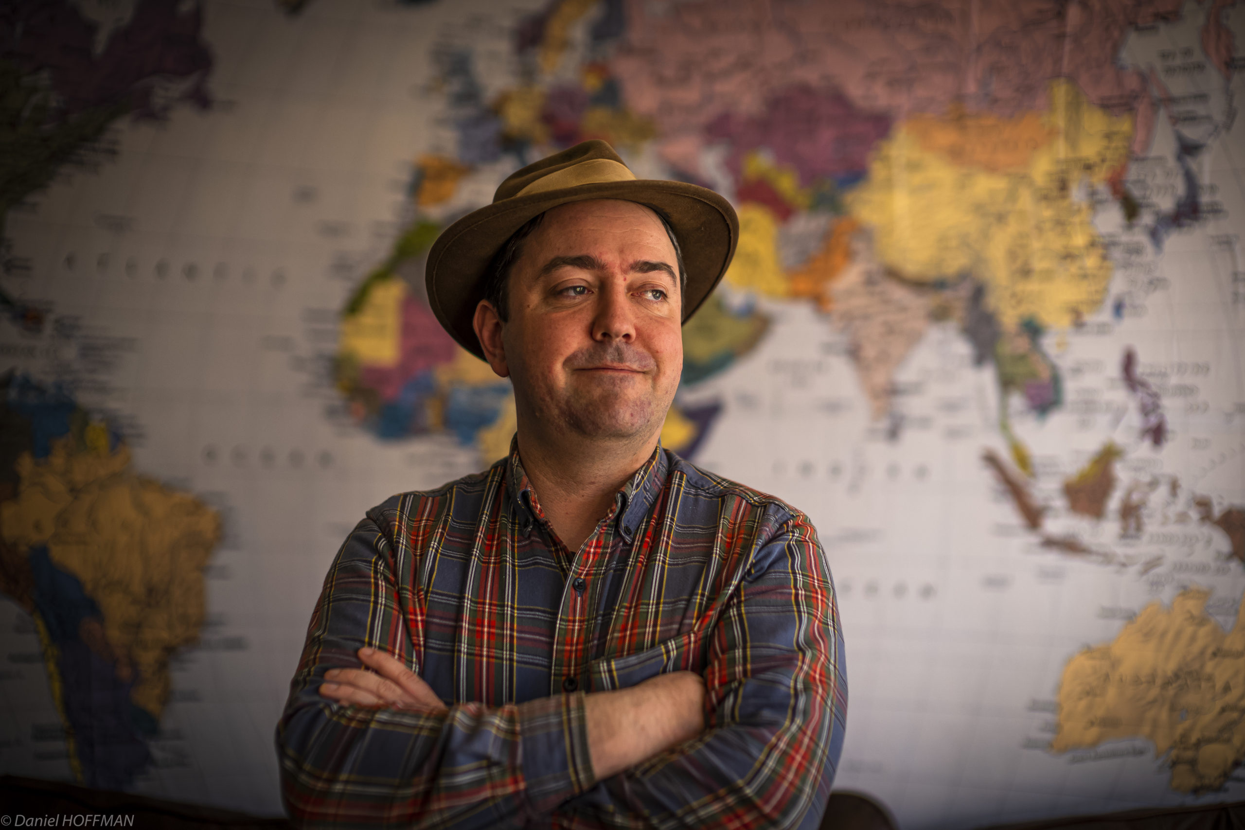 R. Jean Mathieu before a map