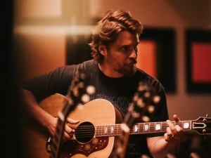 How a Busted Pilot Called ‘Outlaw Country’ Helped Luke Grimes Record His First Song