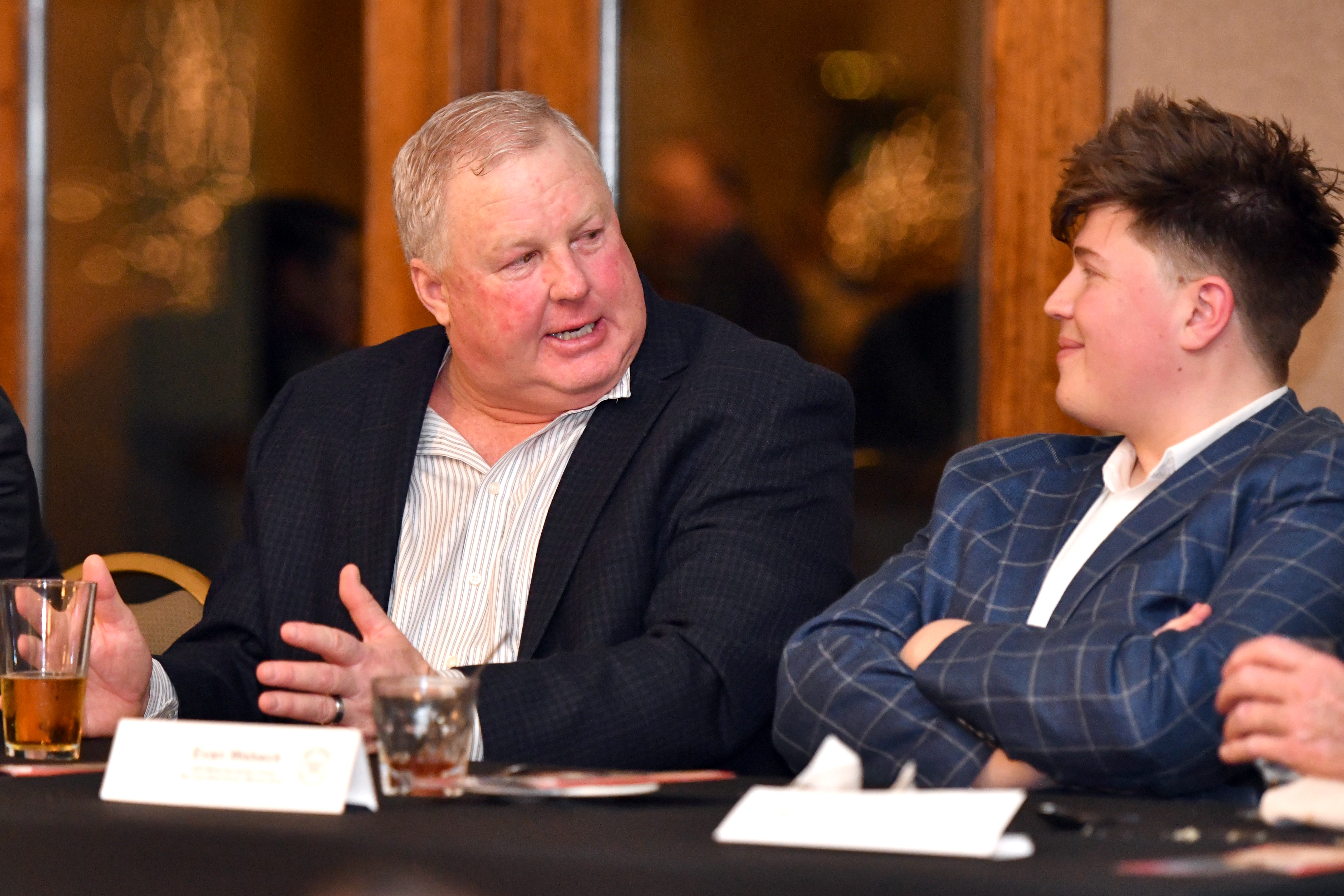 MLB umpire Bill Miller, left, chats with Evan Webeck, the San Francisco Giants' beat writer for BANG, at the 37th annual Hot Stove of Santa Clara Valley Banquet at Villa Ragusa in Campbell on Tuesday.  (Brandon Vallance - Santa Cruz Sentinel)