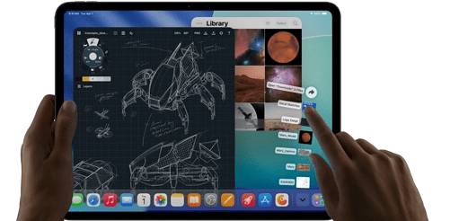 iPad Pro, space black color, left hand holding device, right hand pointing gesturing to manipulate multiple open app windows, a drawing app with sketches of mechanical designs, photos library of planets and space images, downloads folder files fanned out