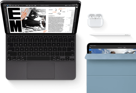 iPad Pro attached to Magic Keyboard, front exterior, space black color, rounded corners, black display bezel, open, display showing article editing app with text and photograph of a woman playing music, Airpods 4 in open case, blue Smart Folio cover on iPad Pro with Apple Pencil Pro resting atop device, cover slightly open revealing display