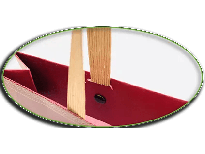 Metal button fastened handles for paper bags, providing sturdy support and stylish finishing for packaging products.