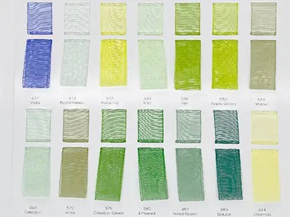 Polyester organza ribbon with a sheer, lightweight finish, ideal for elegant packaging and decorative designs.