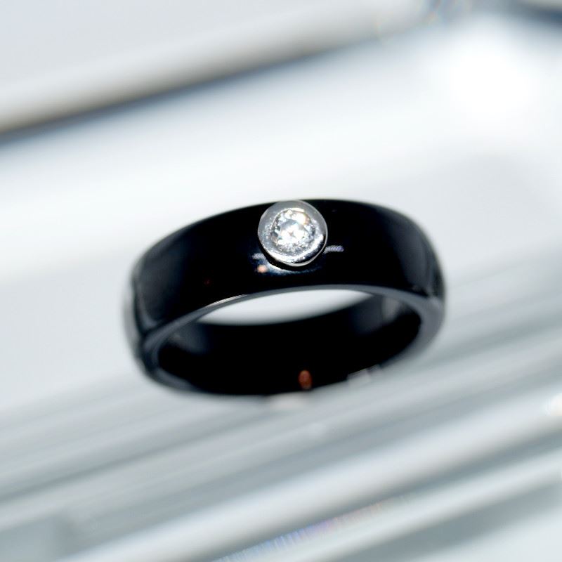 SN00009þBAGUE CERAMICA NERA SOLITARIO 52