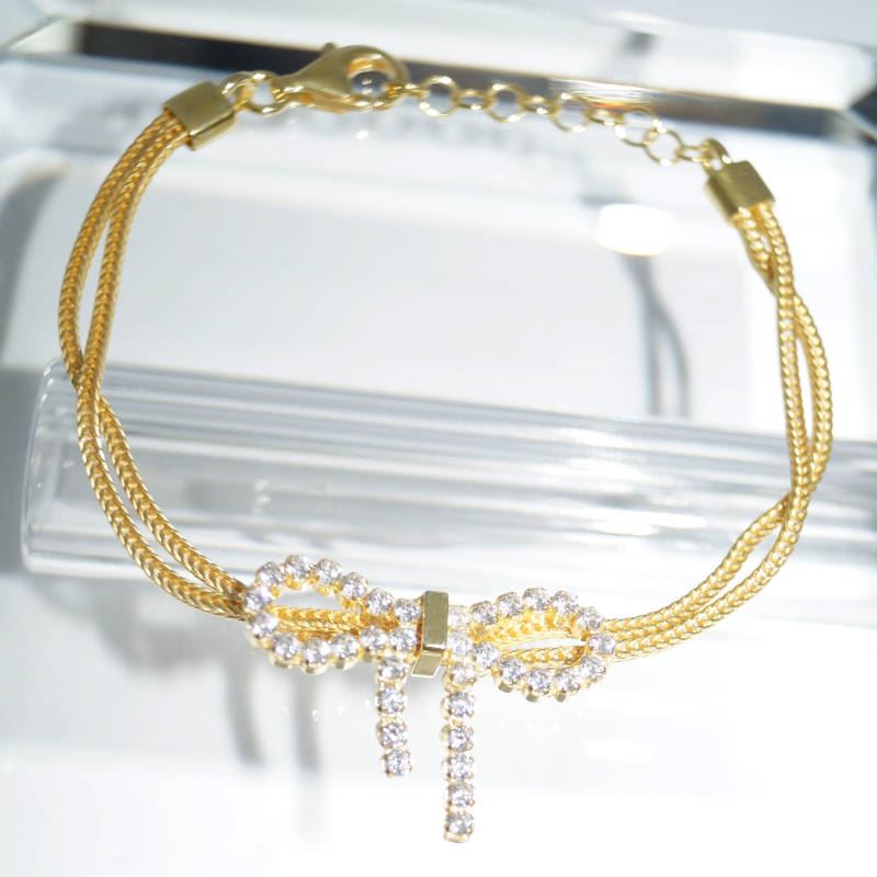 SX01257þBracelet Double Noeud Rosette Pave Dore