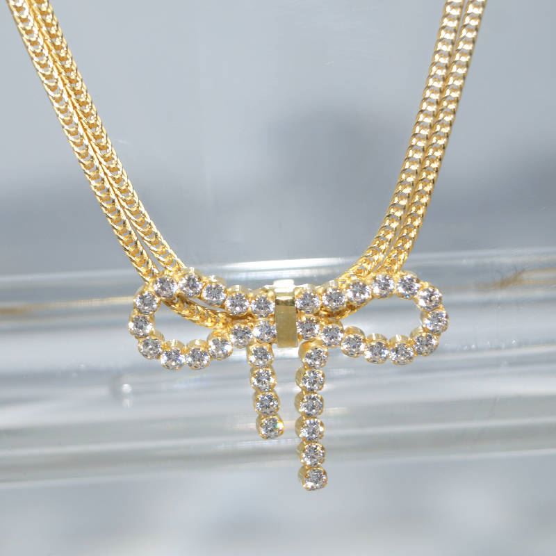 SX01309þCollier Double Noeud Rosette Pave Dore