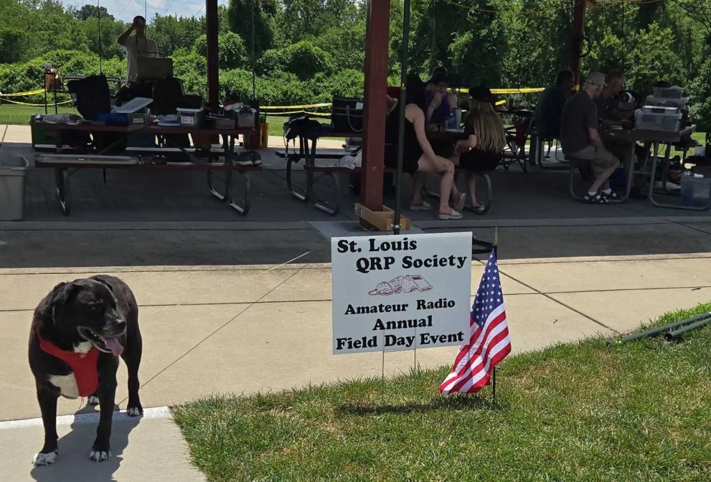 Image of St. Louis QRP Society Field Day sign. Includes American flag, and a dog whose call sign is K9DOG.