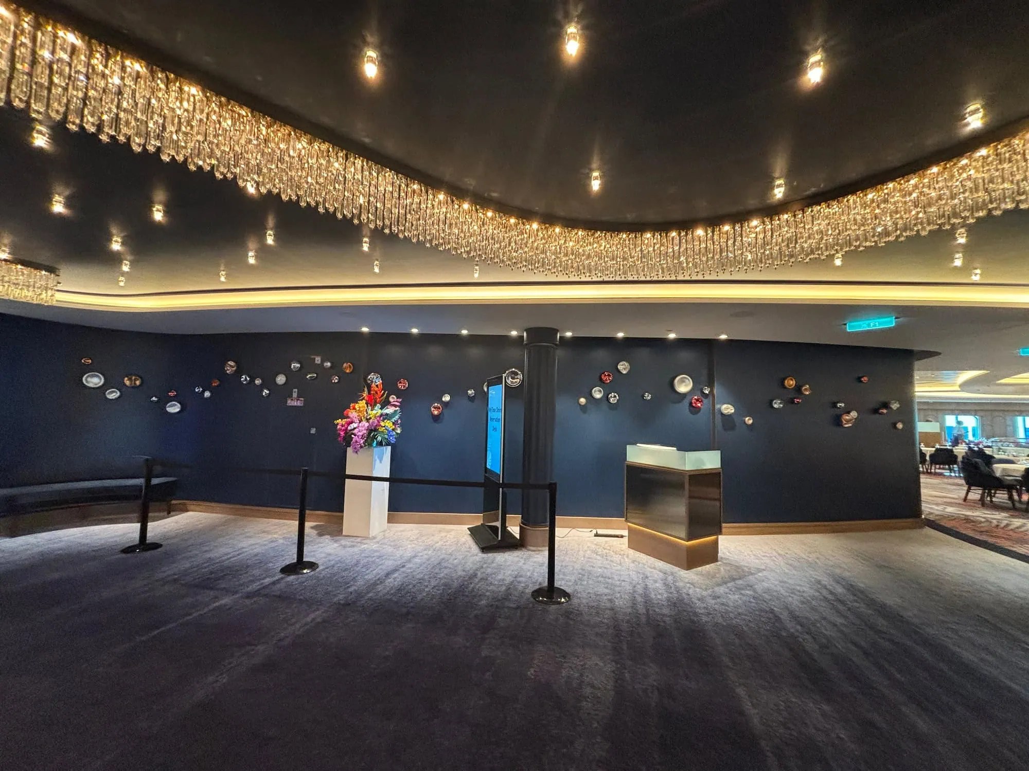 hand blown glass Wall Pearl and Orba in gold silver and ruby finishes on linen-panelled curved wall, spa area Royal Caribbean Legend of the Seas