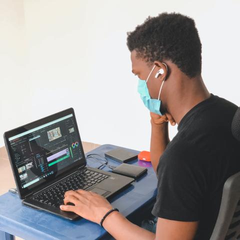 A person is working on a laptop.